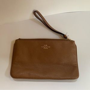 Coach tan pebble coated canvas wristlet